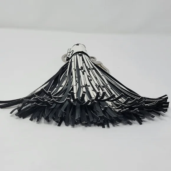 LOUIS VUITTON Monogram Tassel Bag Charm - Picture 7 of 9